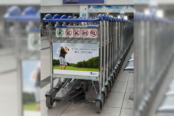 Размещение рекламы на багажных тележках в аэропорту в Анталии