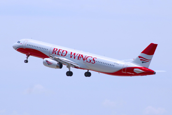 Реклама в самолётах авиакомпании Red Wings Airlines