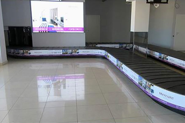 Размещение рекламы на багажном транспортёре в аэропорту Баландино в Челябинске